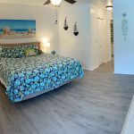 master bedroom with master bathroom